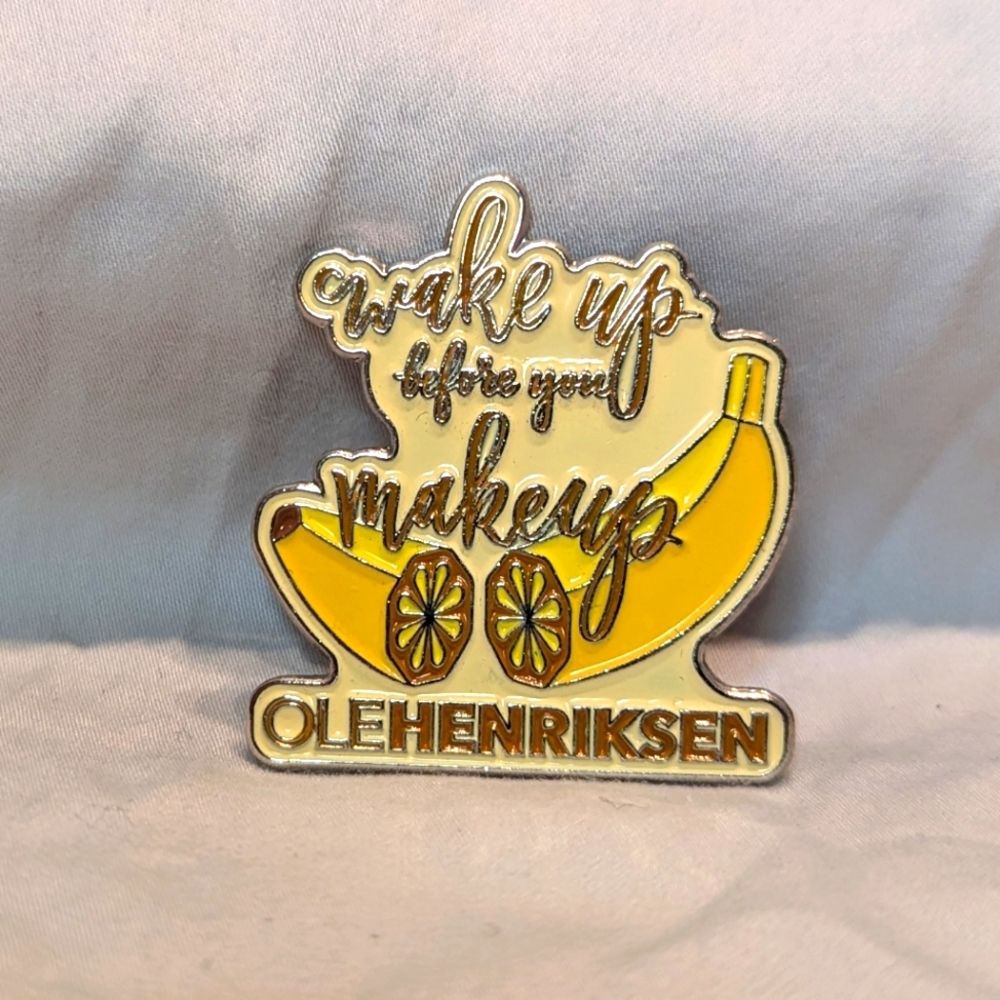 Ole Henriksen Enamel Pin